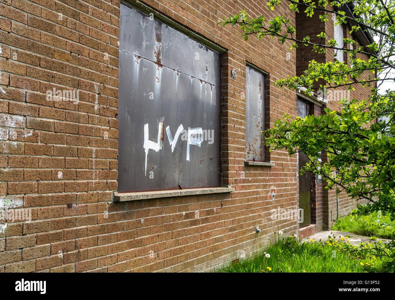 UVF graffiti on boarded up derelict house in loyalist Ballybeen area of