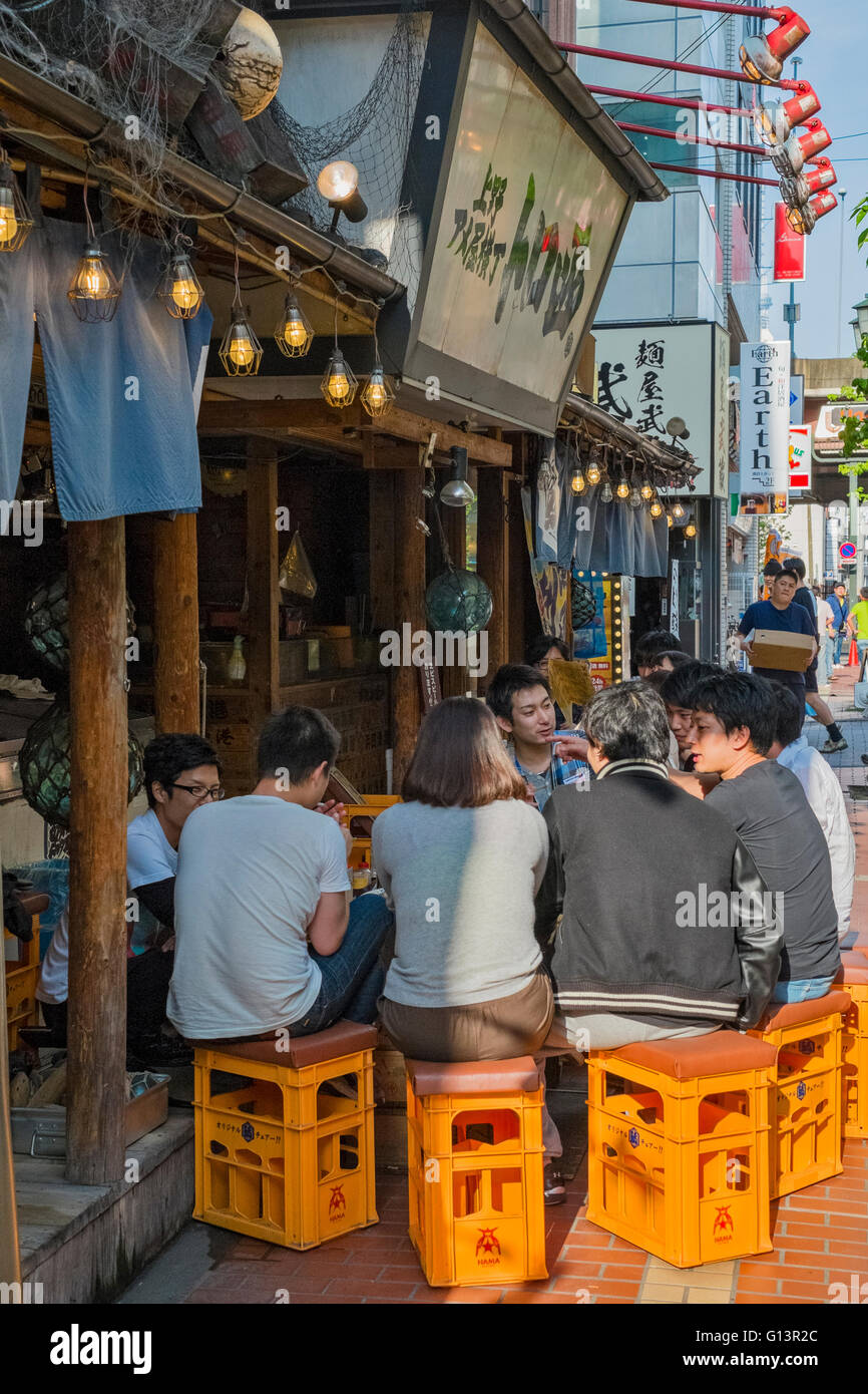 People eating and drinking in Japan Stock Photo