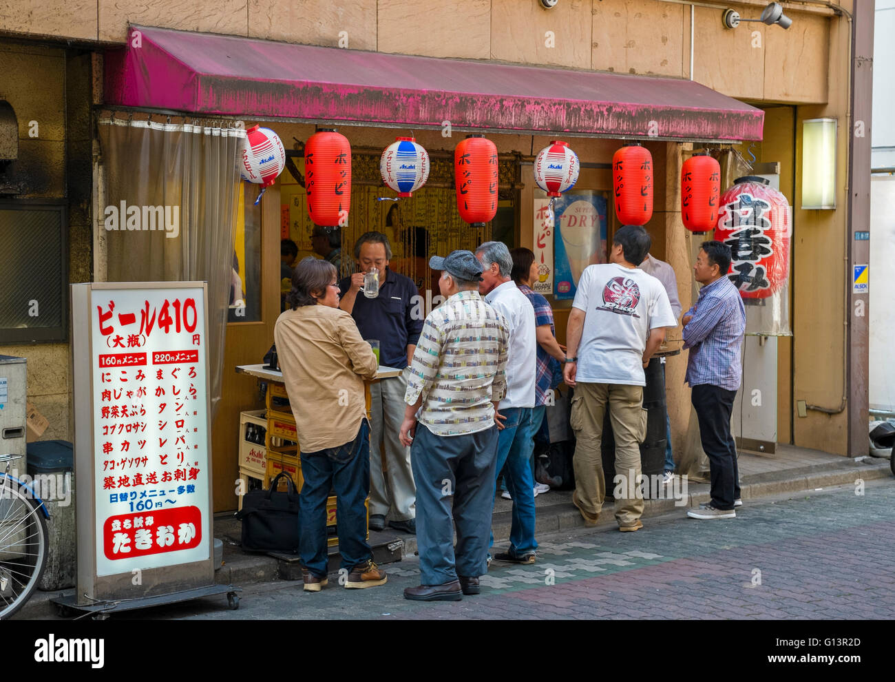 People eating and drinking in Japan Stock Photo