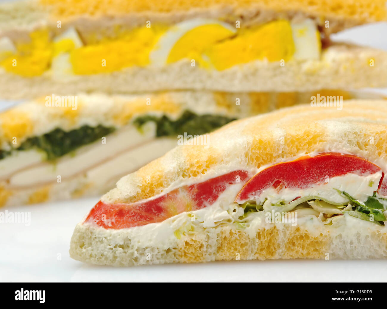 Colorful sandwich isolated on white background Stock Photo Alamy