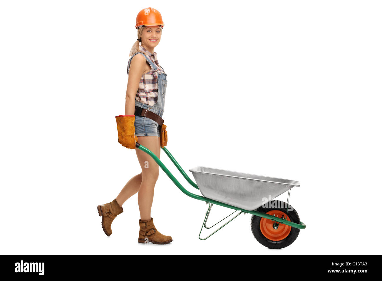 Construction Worker Pushing Wheelbarrow High Resolution Stock ...