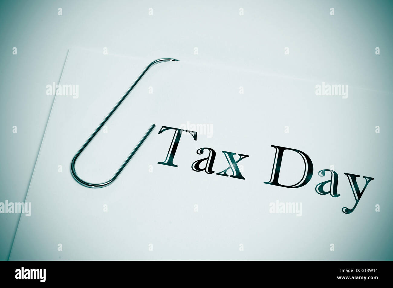 sentence tax day written in the cover of a dossier Stock Photo