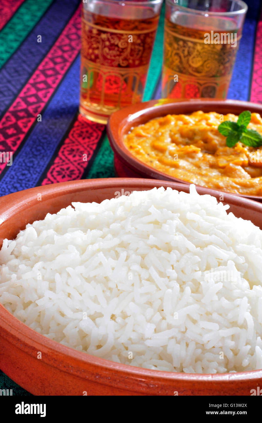 closeup of some bowls with basmati rice and korma curry Stock Photo