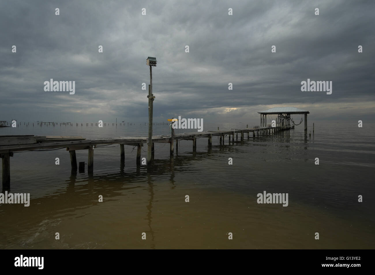 Clouds hover over Mobile Bay in southern Alabama on a gray dismal day. Stock Photo