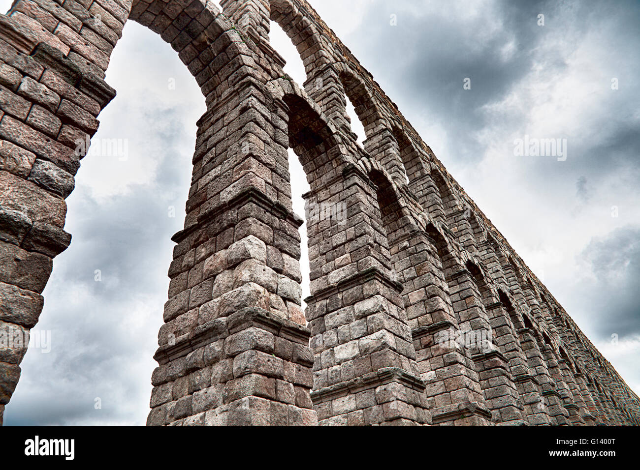 an old stone aqueduct in Segovia, Spain Stock Photo - Alamy