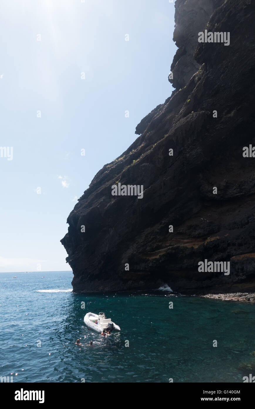 Los Gigantes cliffs in Tenerife viewed from Masca beach, a wild beach that can only be accessed through the Masca canyon Stock Photo