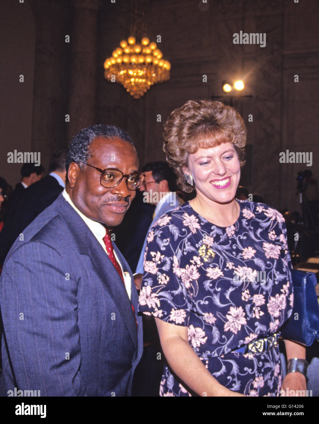 Judge Clarence Thomas, left, and his wife, Virginia, right, arrive for the hearing before the US Senate Judiciary Committee to confirm him as Associate Justice of the US Supreme Court in the US Senate Caucus Room in Washington, DC on September 10, 1991. Thomas was nominated for the position by US President George H.W. Bush on July 1, 1991 to replace retiring Justice Thurgood Marshall. Credit: Arnie Sachs/CNP Stock Photo