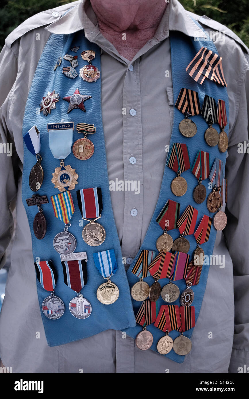 A soviet Jewish World War II veteran with medals pinned in his clothes  during ceremony marking the Allied Victory over Nazi Germany in Israel Stock Photo
