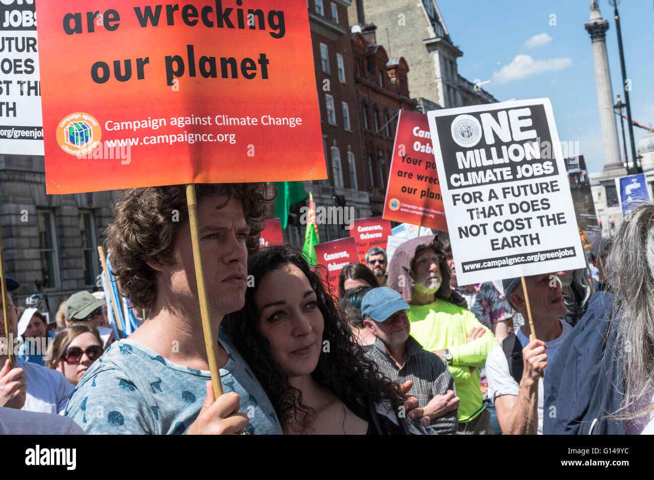 London, UK. 08th May 2016. Activists and campaigners gather to protest against government's policy on climate change. Participants marched backwards from top of  Whitehall to the Department of Health to symbolically show reversal of government actions on several issues such as fracking, renewable energy, fossil fuels, sustainable transport. Protesters appealed to go forward rather than backward on climate policy in the first anniversary of the current government. Wiktor Szymanowicz/Alamy Live News Stock Photo