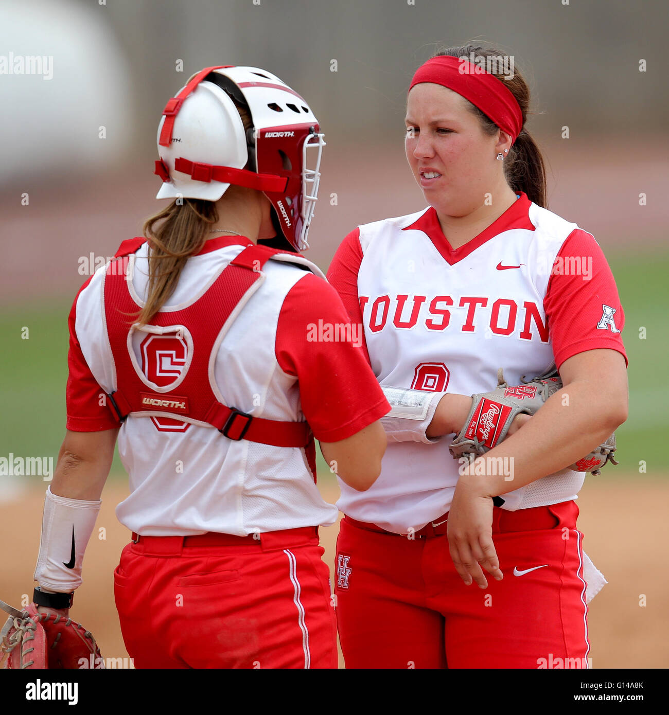 Houston, TX, USA. 08th May, 2016. Houston pitcher Julana Shrum #8 (right) talks with catcher Megan Noel #6 during the sixth inning of the NCAA softball game between Houston and Memphis from Cougar Softball Stadium in Houston, TX. Credit image: Erik Williams/Cal Sport Media/Alamy Live News Stock Photo
