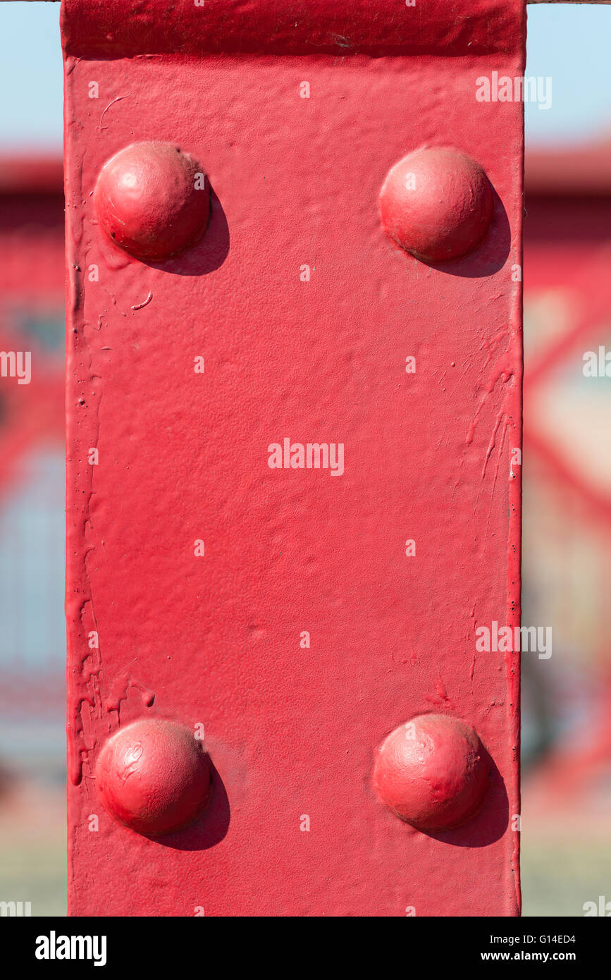 old red metal background with rivets Stock Photo