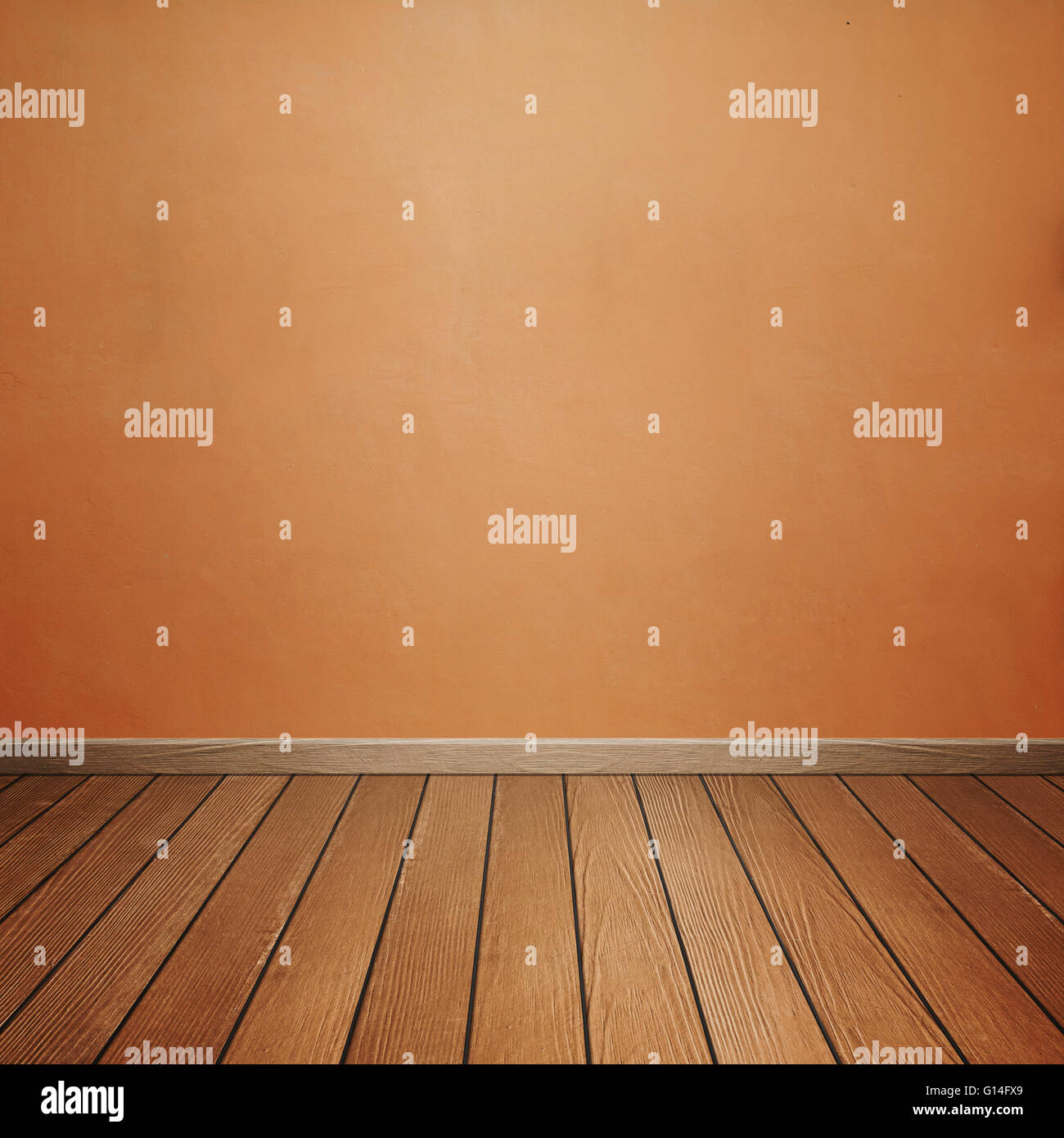 empty room interior with concrete wall and brown wood floor Stock Photo