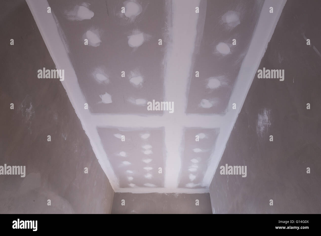 Gypsum board ceiling house construction hires stock photography and