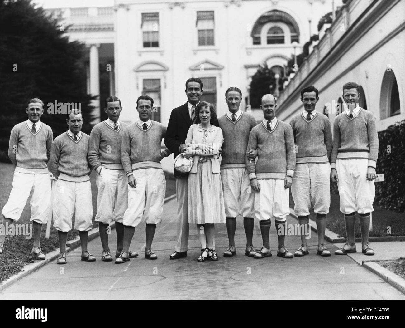 6/22/1925: "Local entertainers at the White House, where they called on the President. Brooke Johns with his Oklahoma Collegians, now playing in Washington, will shortly go to London on a musical tour. Miss Goode Montgomery, dancer with the musicians, is Stock Photo