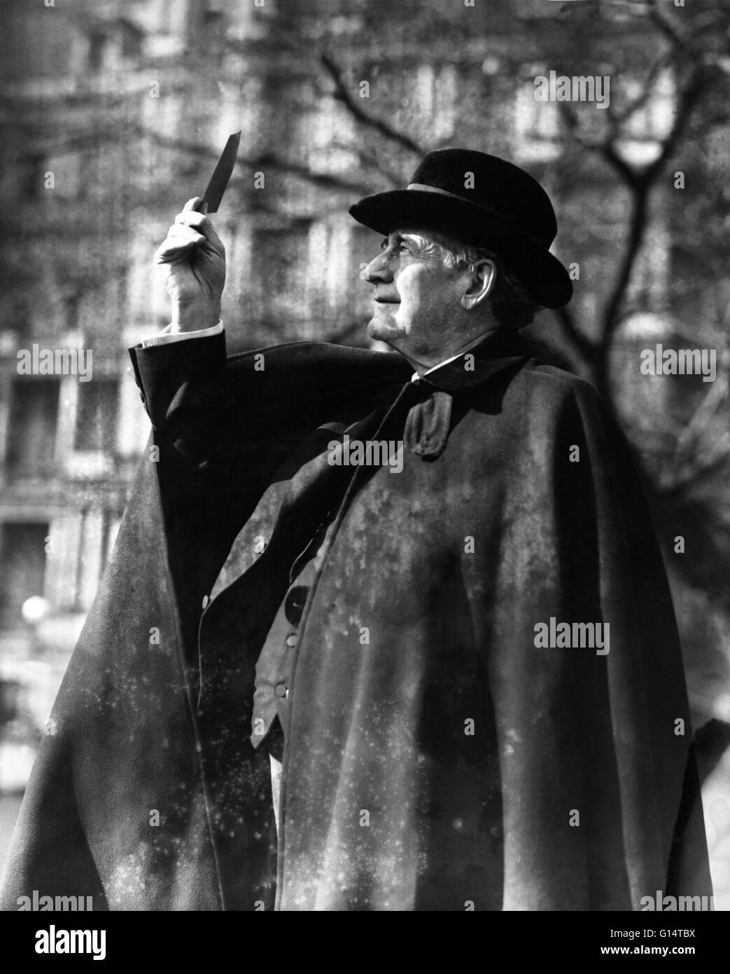 Bryan comparing the eclipse he's viewing to the defeat of the Democratic Party, stating that the loss is only temporary and that the sun will soon shine again. Photo taken on January 24, 1925. William Jennings Bryan (March 19, 1860 - July 26, 1925) was a Stock Photo