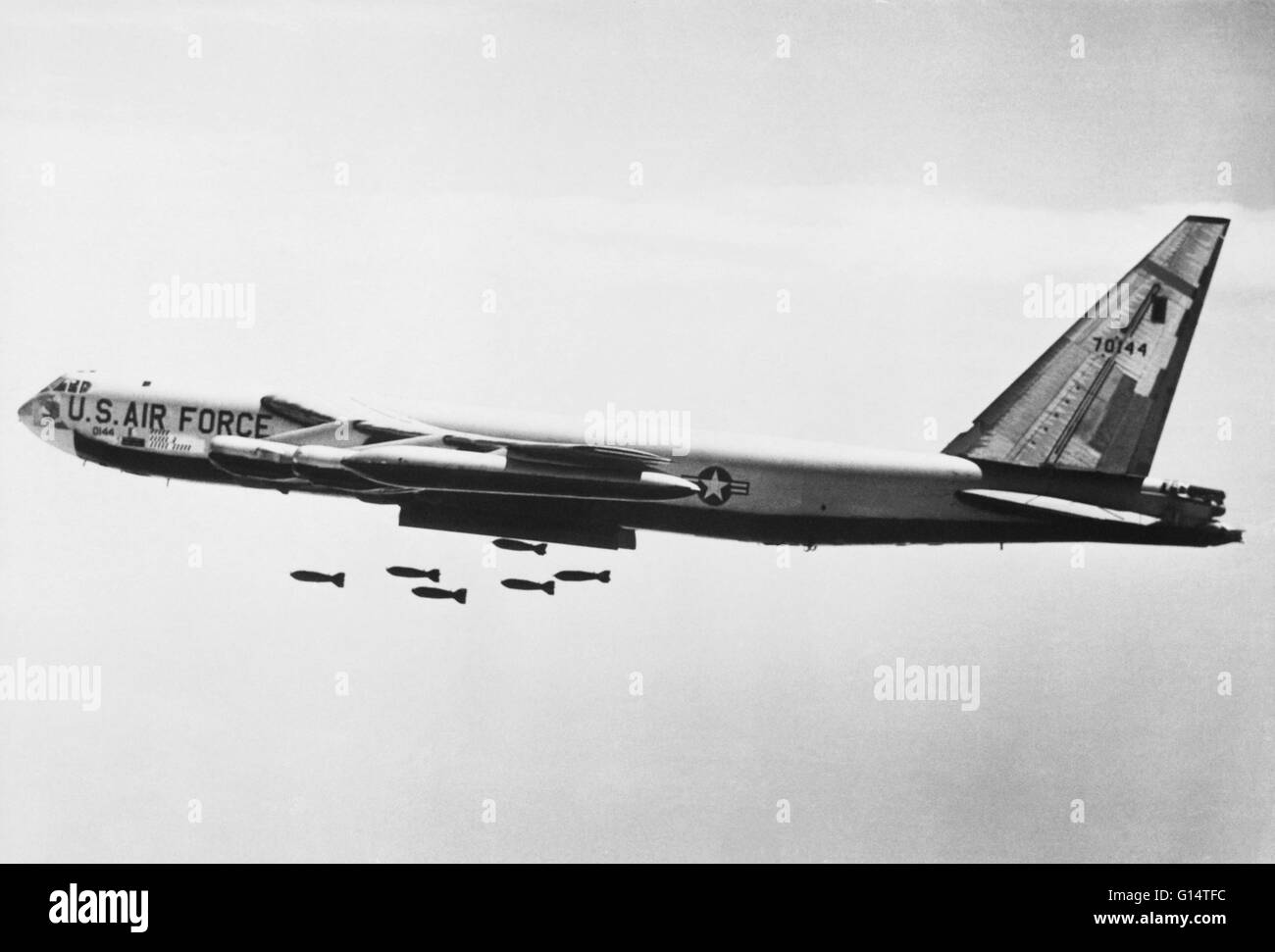 Undated image of a B-52 bomber dropping conventional bombs over Vietnam. Stock Photo