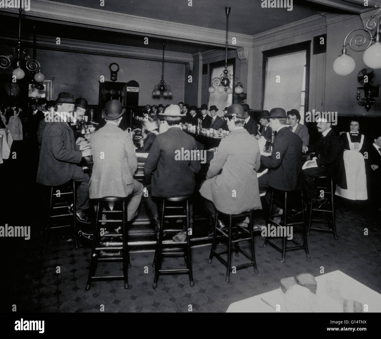 YMCA restaurant circa 1900. The Young Men's Christian Association was founded in London in 1844 by Sir George Williams in response to the 'unhealthy social conditions' (such as gambling and drinking) arising in cities at the end of the Industrial Revoluti Stock Photo