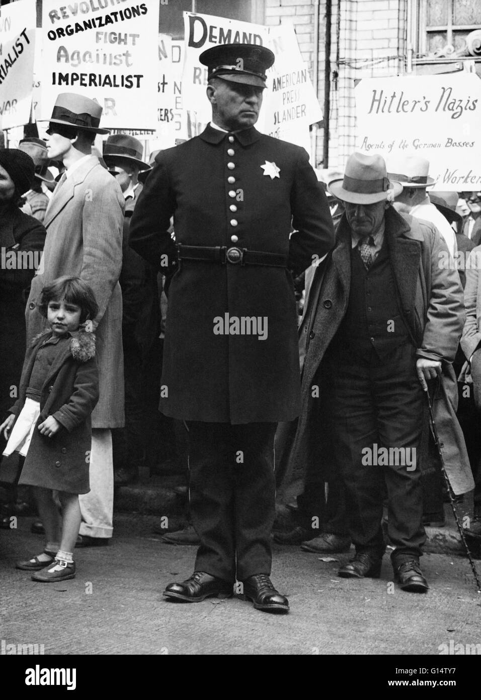 Protestors and a police officer at a street demonstration in San Francisco, California, taken by Dorothea Lange in 1936. Stock Photo