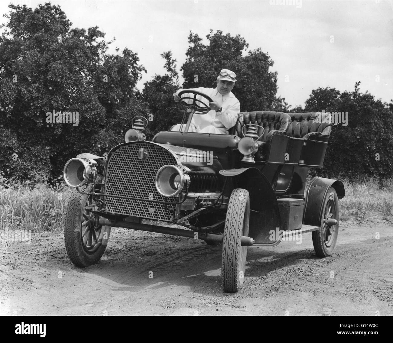 A man driving a 1902 Rambler. Stock Photo