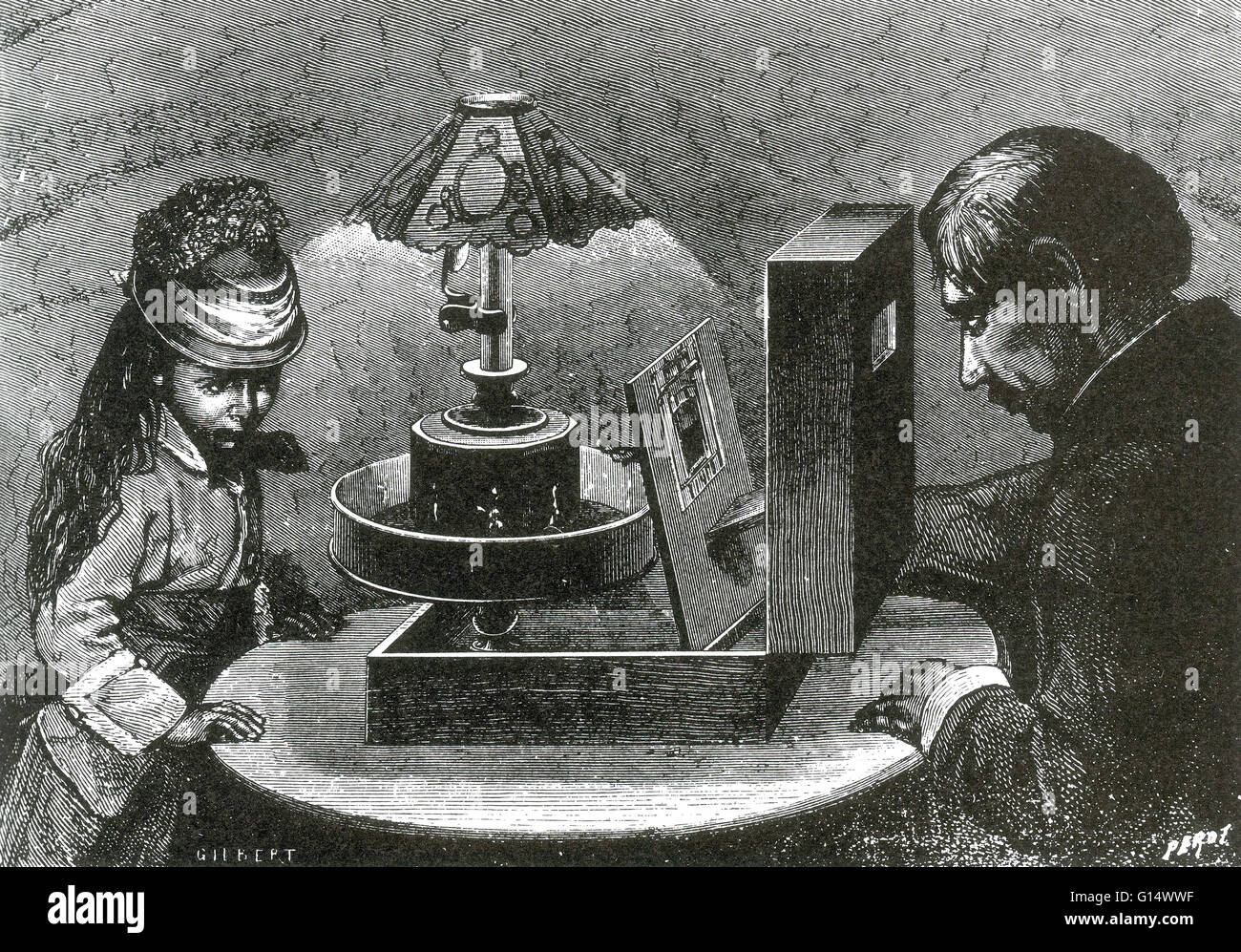 The praxinoscope was an animation device, the successor to the zoetrope. It was invented in France in 1877 by Charles-Émile Reynaud. Like the zoetrope, it used a strip of pictures placed around the inner surface of a spinning cylinder. The praxinoscope im Stock Photo