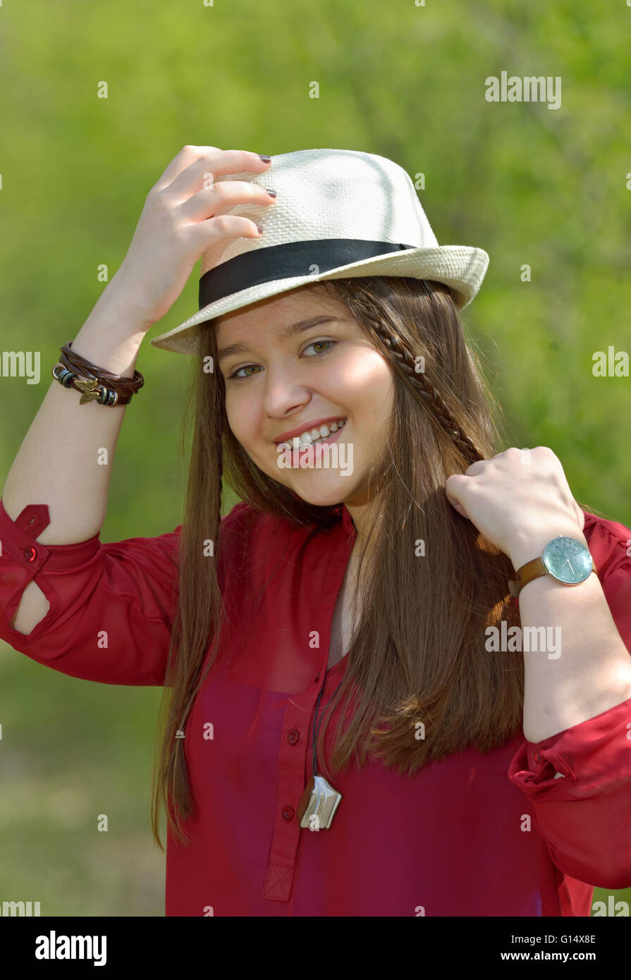 Portrait of teen girl in forest in spring time Stock Photo