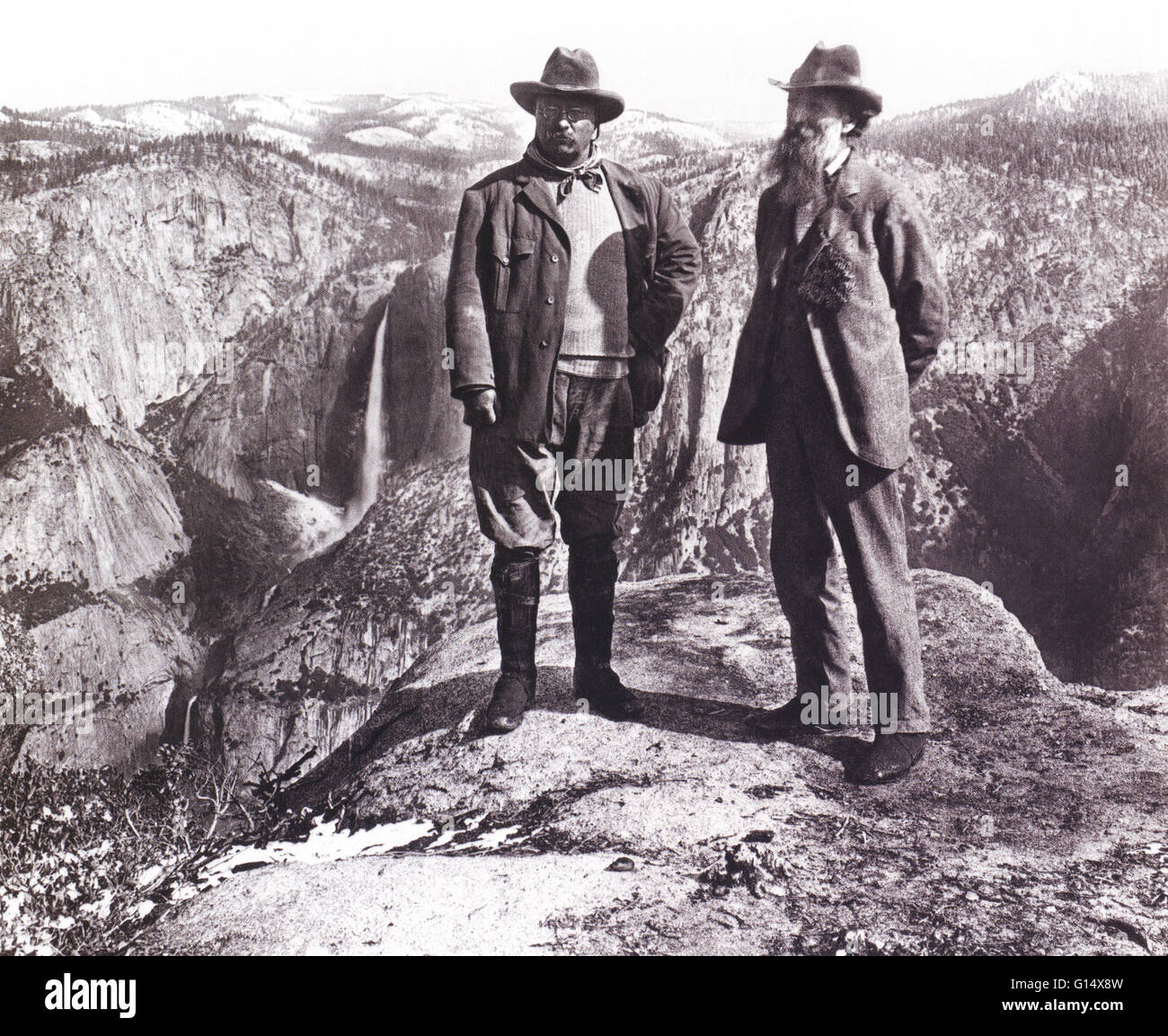 Teddy Roosevelt and John Muir on Glacier Point, Yosemite, 1903. Theodore 'Teddy' Roosevelt (1858-1919) was the 26th President of the United States (19011-1909). He is noted for his exuberant personality, range of interests and achievements, and his leader Stock Photo