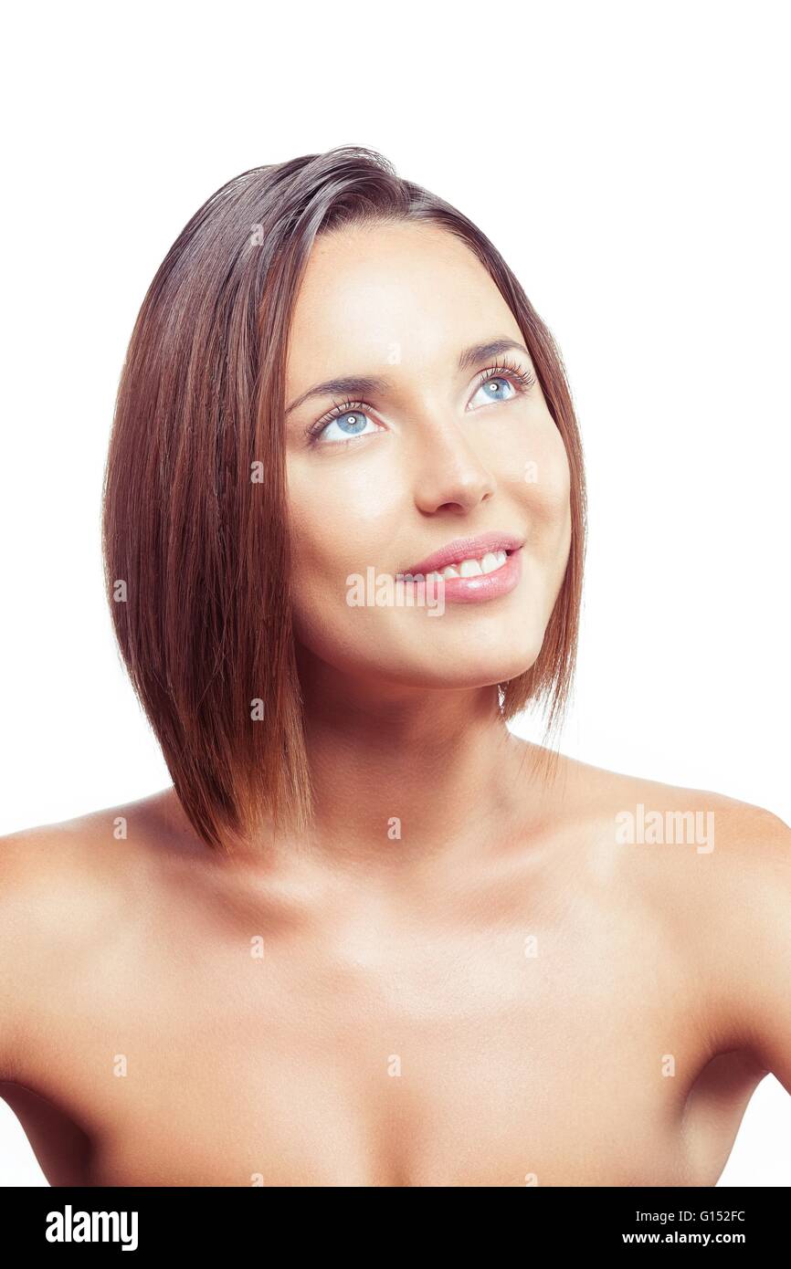Portrait of a young woman smiling look up Stock Photo