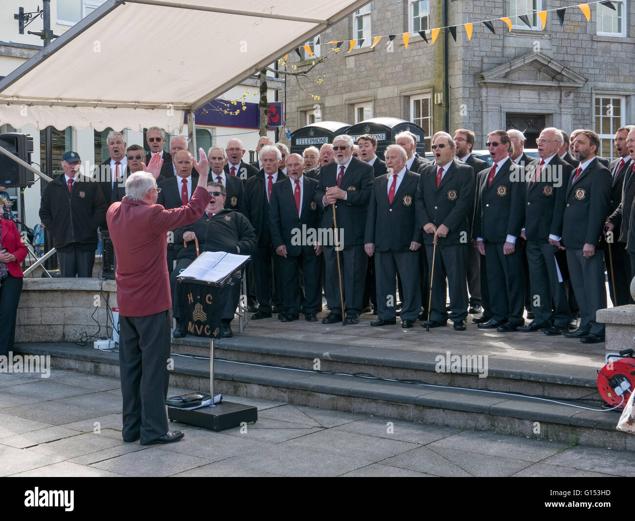 Holman Climax Cornish male voice choir signing during Trevithick day in Camborne, Cornwall England UK. Stock Photo