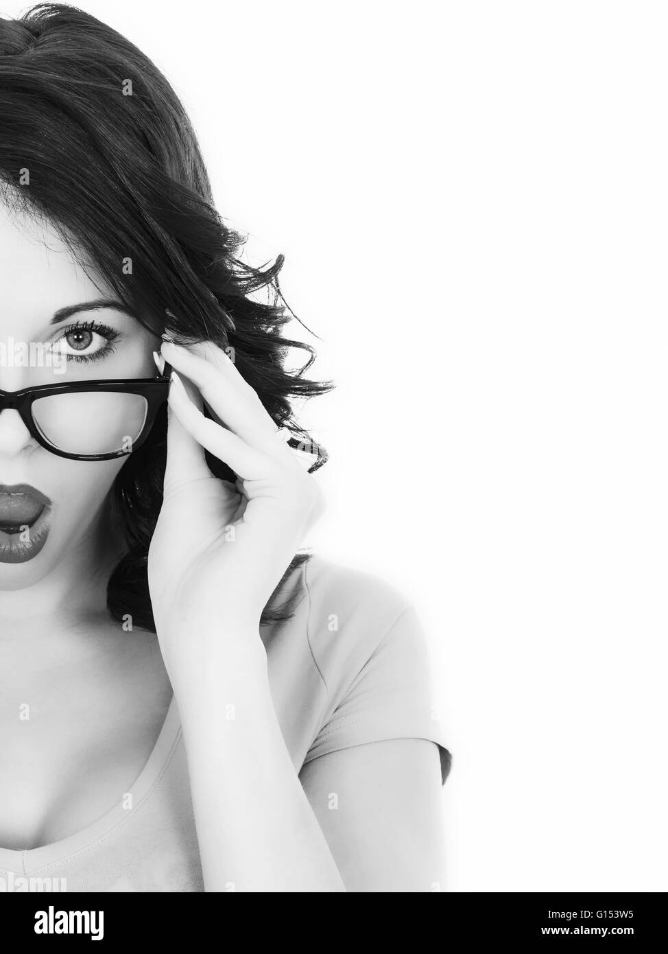 Portrait of a Woman Wearing Glasses Looking Shocked With Copy Space Stock Photo
