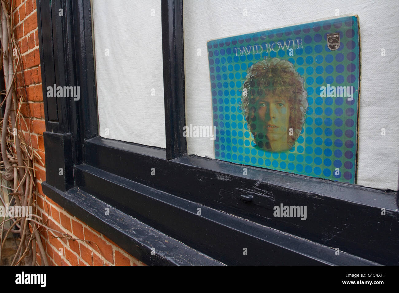 David Bowie album cover Space Oddity displayed in a window Stock Photo