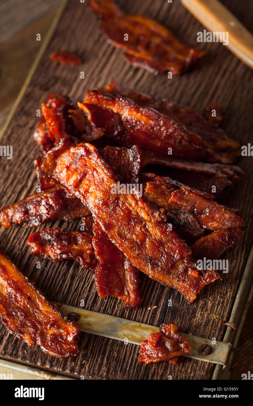 Homemade Dried Barbecue Bacon Jerky with Salt Stock Photo Alamy
