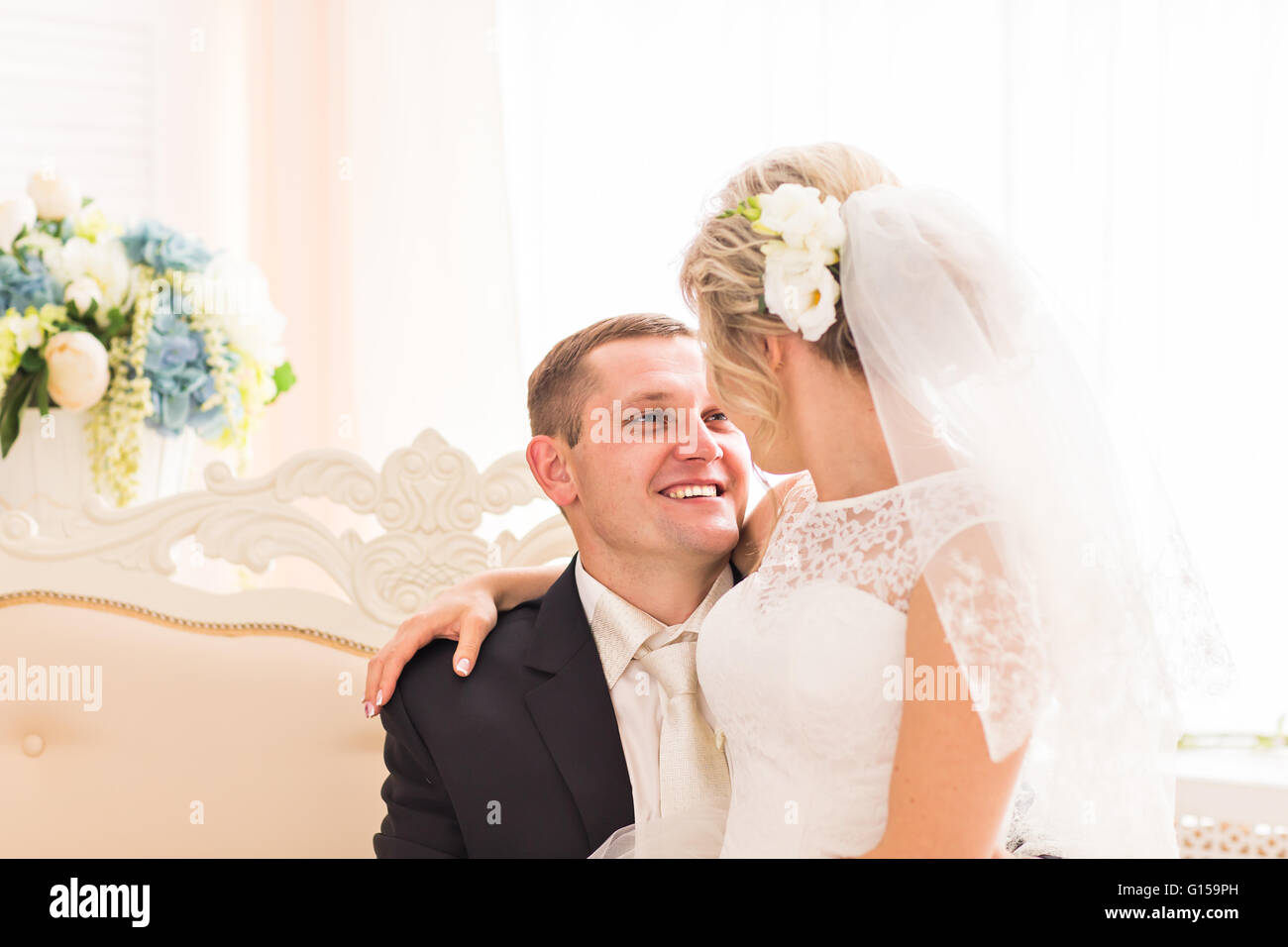 Young wedding couple enjoying romantic moments Stock Photo - Alamy