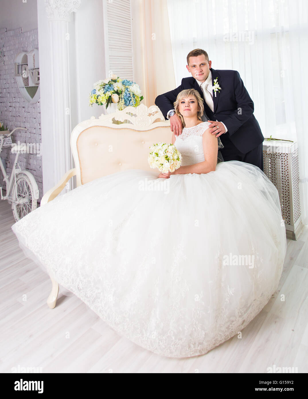 Young wedding couple enjoying romantic moments Stock Photo - Alamy
