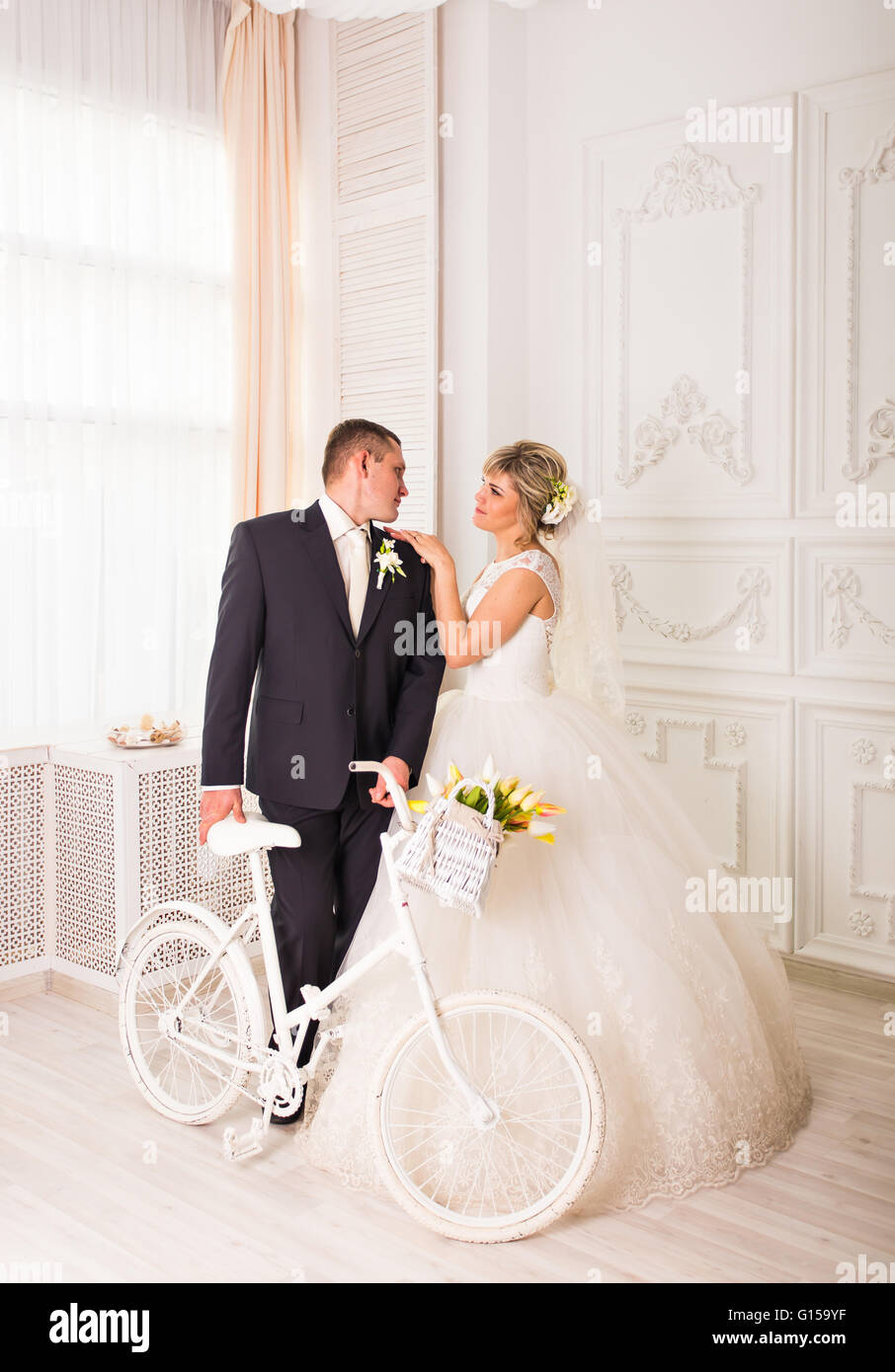 Young wedding couple enjoying romantic moments Stock Photo - Alamy