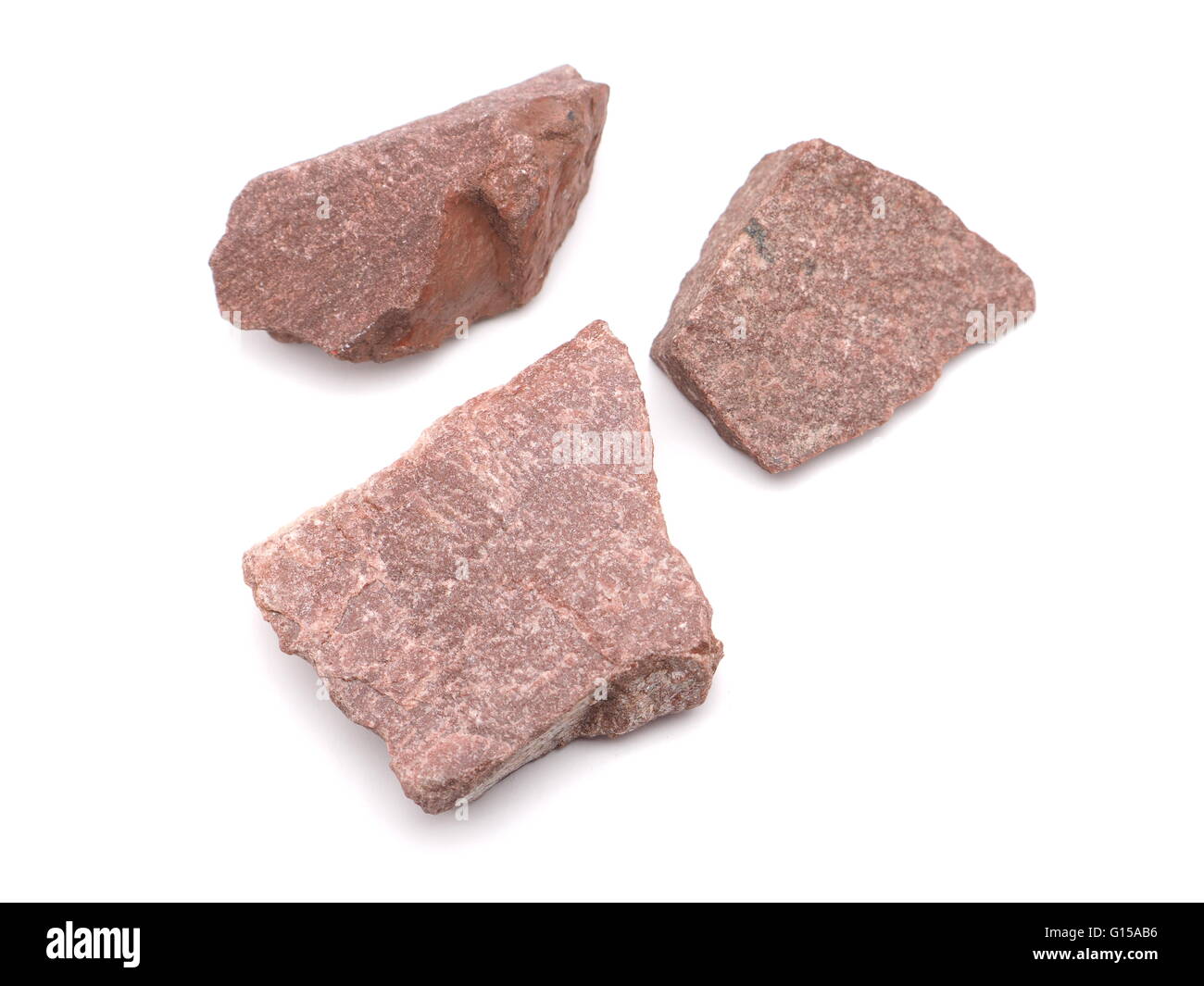 quartzitic sandstone crimson on a white background Stock Photo