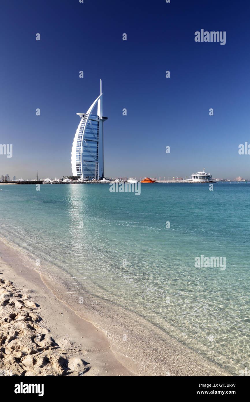 The luxury hotel Burj al Arab at Jumeirah Beach in Dubai, United Arab Emirates. Stock Photo