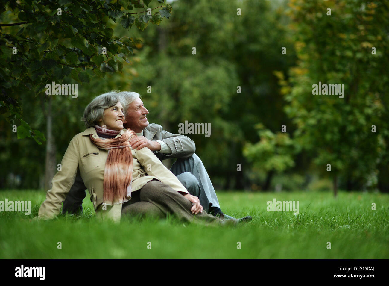 couple walking in the autumn park Stock Photo - Alamy