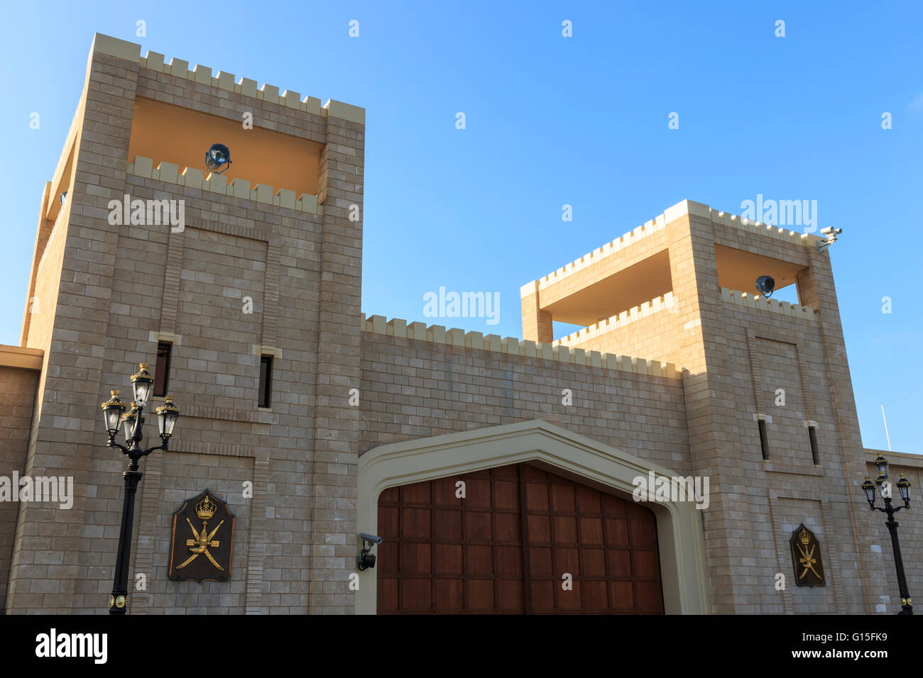 Battlements and huge teak gates of Al-Husn, Sultan's Palace, Salalah, Dhofar Region, Southern Oman, Middle East Stock Photo