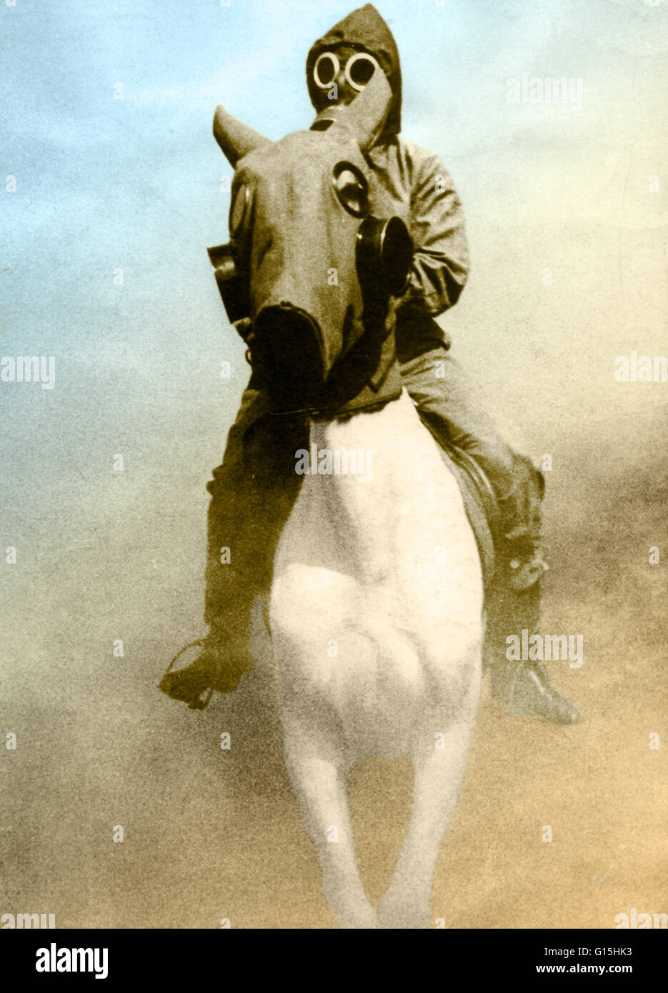 Color enhanced photograph of a rider and horse moving through a staged gas attack at a routine press call at Oranienburg near Berlin, 1932. Stock Photo