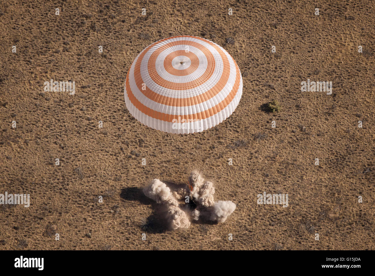 The Soyuz TMA-21 spacecraft lands in a remote area outside of the town of Zhezkazgan, Kazakhstan, on Friday, September 16, 2011. Stock Photo