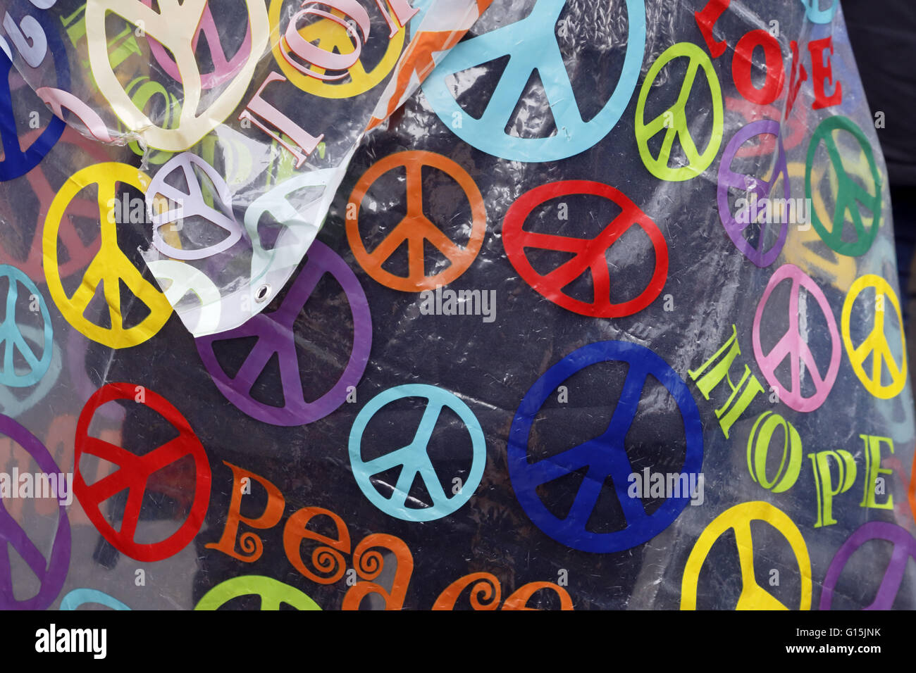 CND symbols on a transparent raincoat Stock Photo Alamy