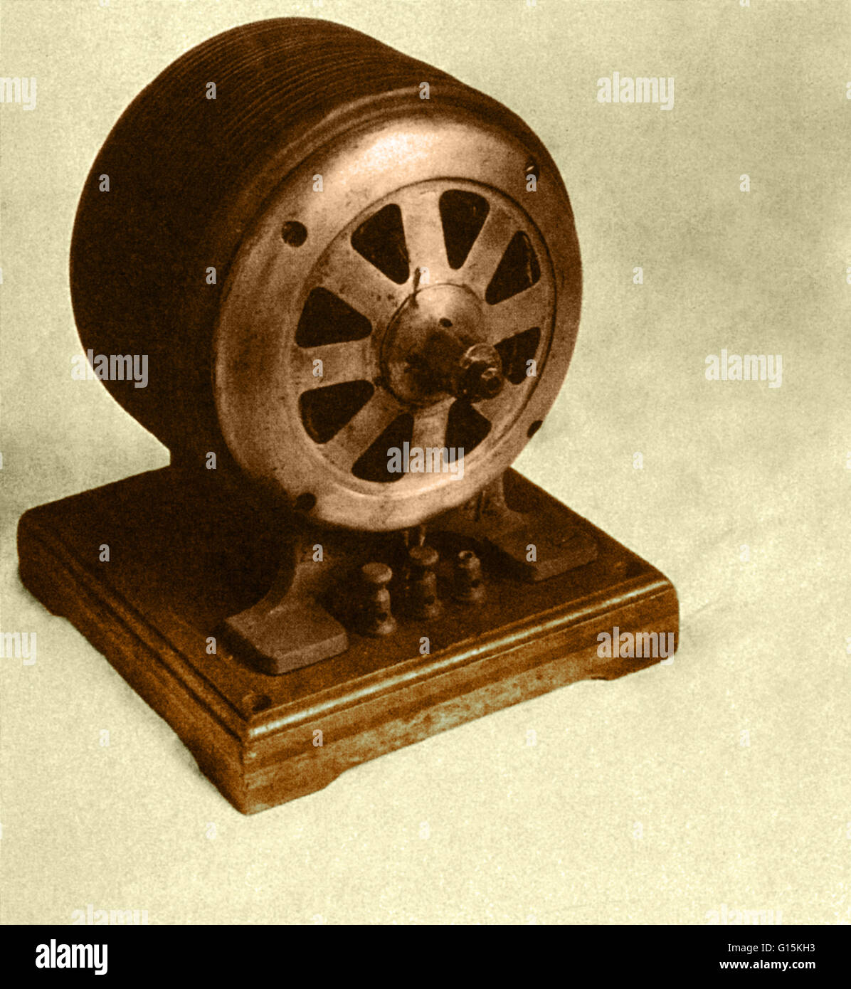 Color enhanced photo of an early Tesla induction motor manufactured by the Westinghouse Electric Company. An induction motor is an electric motor that has no electrical connections to the rotating part. Induction motors power most of the world electricall Stock Photo