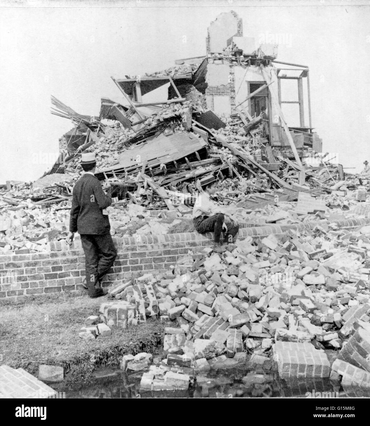 Lucas Terrace under which 51 people lie buried. Remnants of multi-story building, bricks and lumber strewn in the wake of the 1900 hurricane and flood, Galveston, Texas. The Hurricane of 1900 made landfall on the city of Galveston, Texas, on September 8, Stock Photo