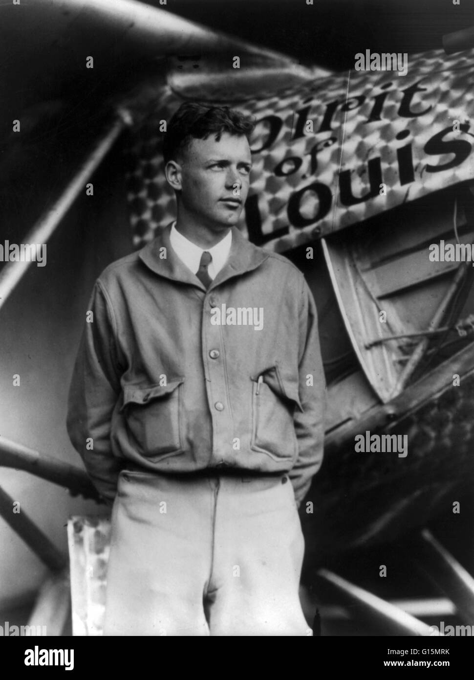Lindbergh, with Spirit of St. Louis in background, May 31, 1927. Charles Augustus Lindbergh (February 4, 1902 - August 26, 1974) was an American aviator. Lindbergh gained world fame as the result of his solo non-stop flight on May 20-21, 1927, made from R Stock Photo