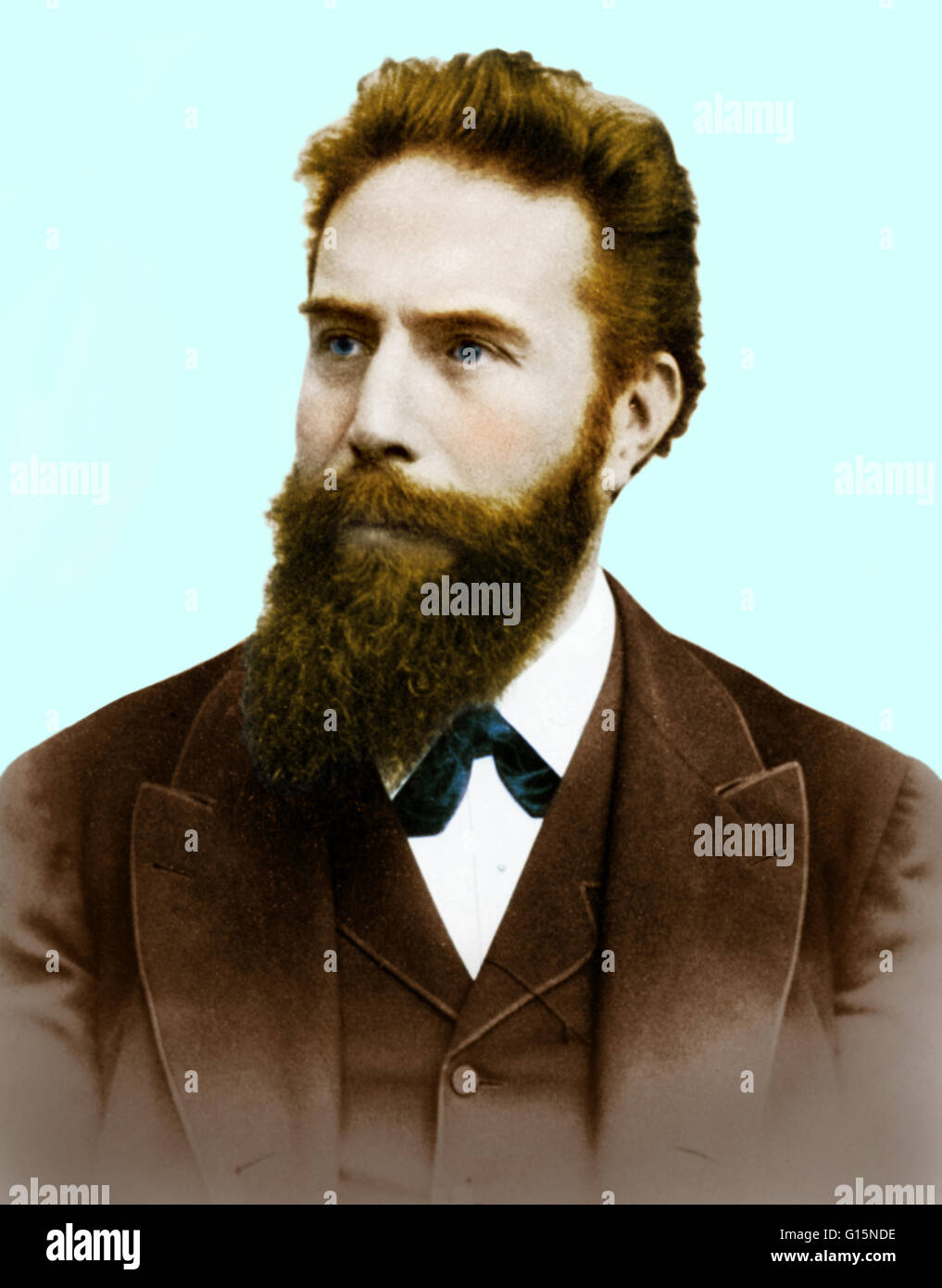 Wilhelm Konrad Roentgen (1845-1923), German experimental physicist and discoverer of X-rays. While using a discharge tube (in which an electric discharge is passed through a gas at low pressure) in a darkened room, Roentgen noticed that a card coated with Stock Photo
