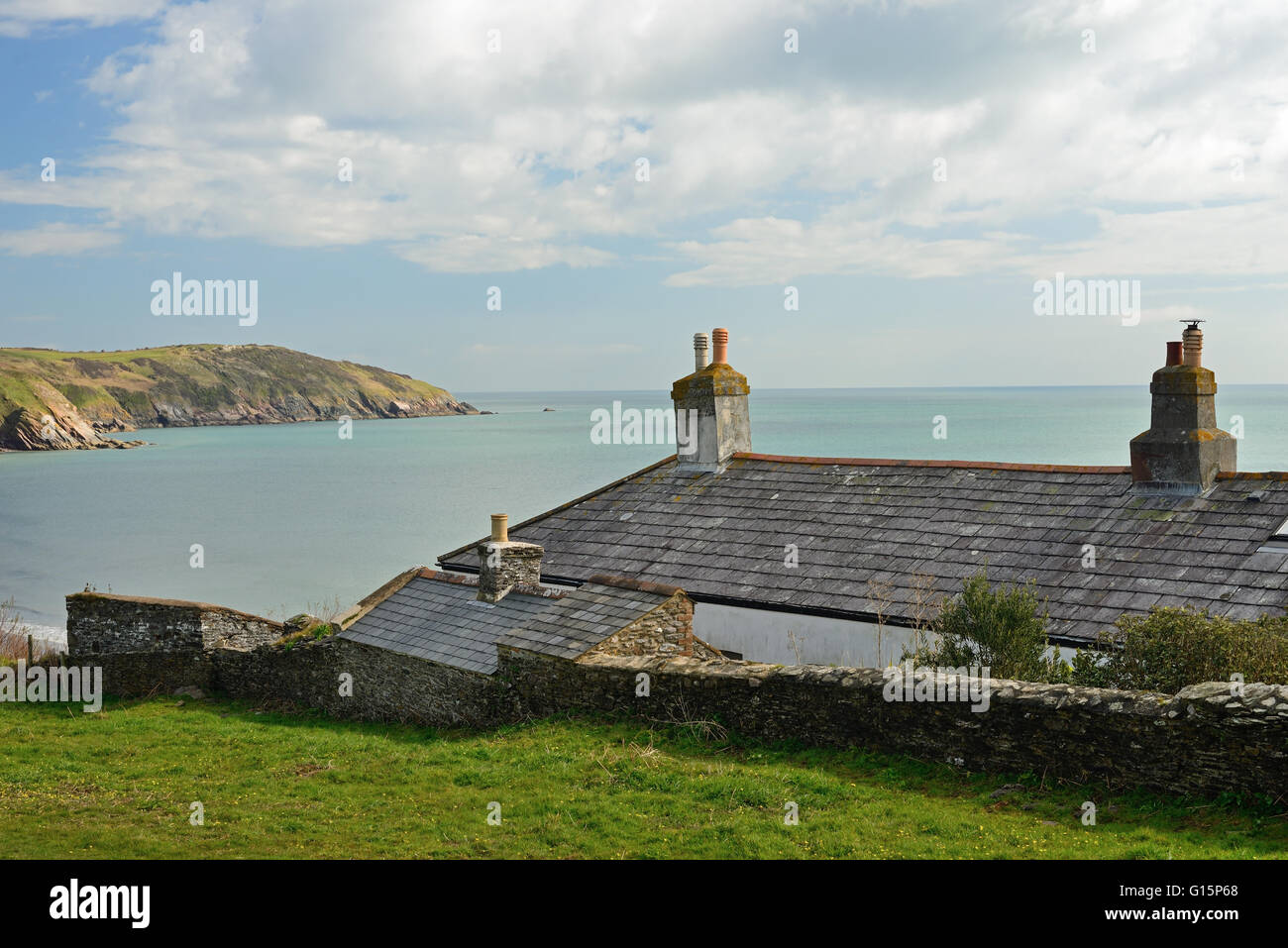 Former coastguard cottages at Man Sands, a secluded bay on the South Devon coast. Stock Photo