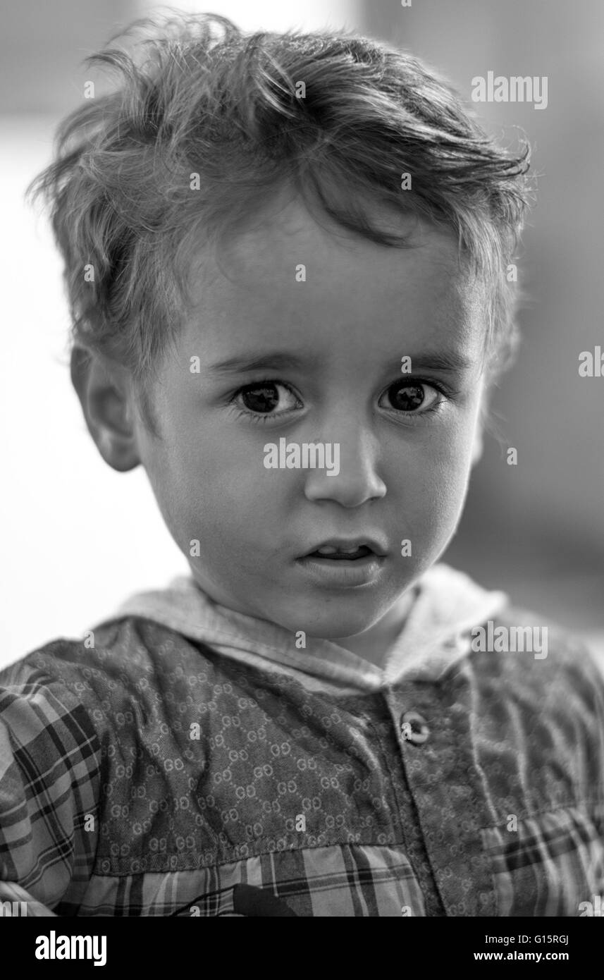 Mohammed Sadat, age 5, black and white portrait in his rural home in Jandab, Hamadan Province, Iran. Stock Photo