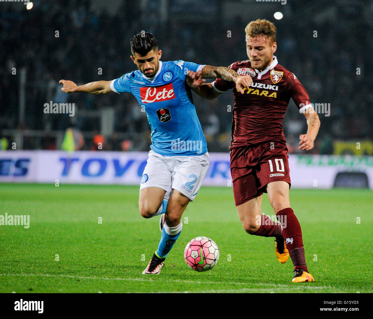 Turin, Italy. 8 may, 2016: Elseid Hysaj (left) and Ciro Immobile compete for the ball during the Serie A football match between Torino FC and SSC Napoli Stock Photo