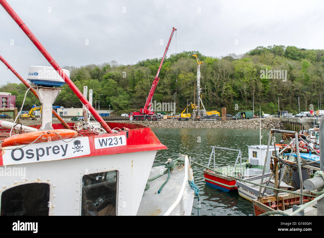Bantry, Ireland. 9th May, 2016. Works are continuing on the €8.5 million first phase of the Bantry Inner Harbour Development. By the time the project is finished, there will be a 20 berth Marina (quayside pontoons) and the harbour will have been dregded to a depth of 4 metres to allow vessels access to the inner harbour.  Additional works will include the widening and extending of the Town Pier, 4,000m2 of reclaimed landscaped amenity area and the construction of a 60m long floating breakwater pontoon.  Credit:  AG News/Alamy Live News Stock Photo