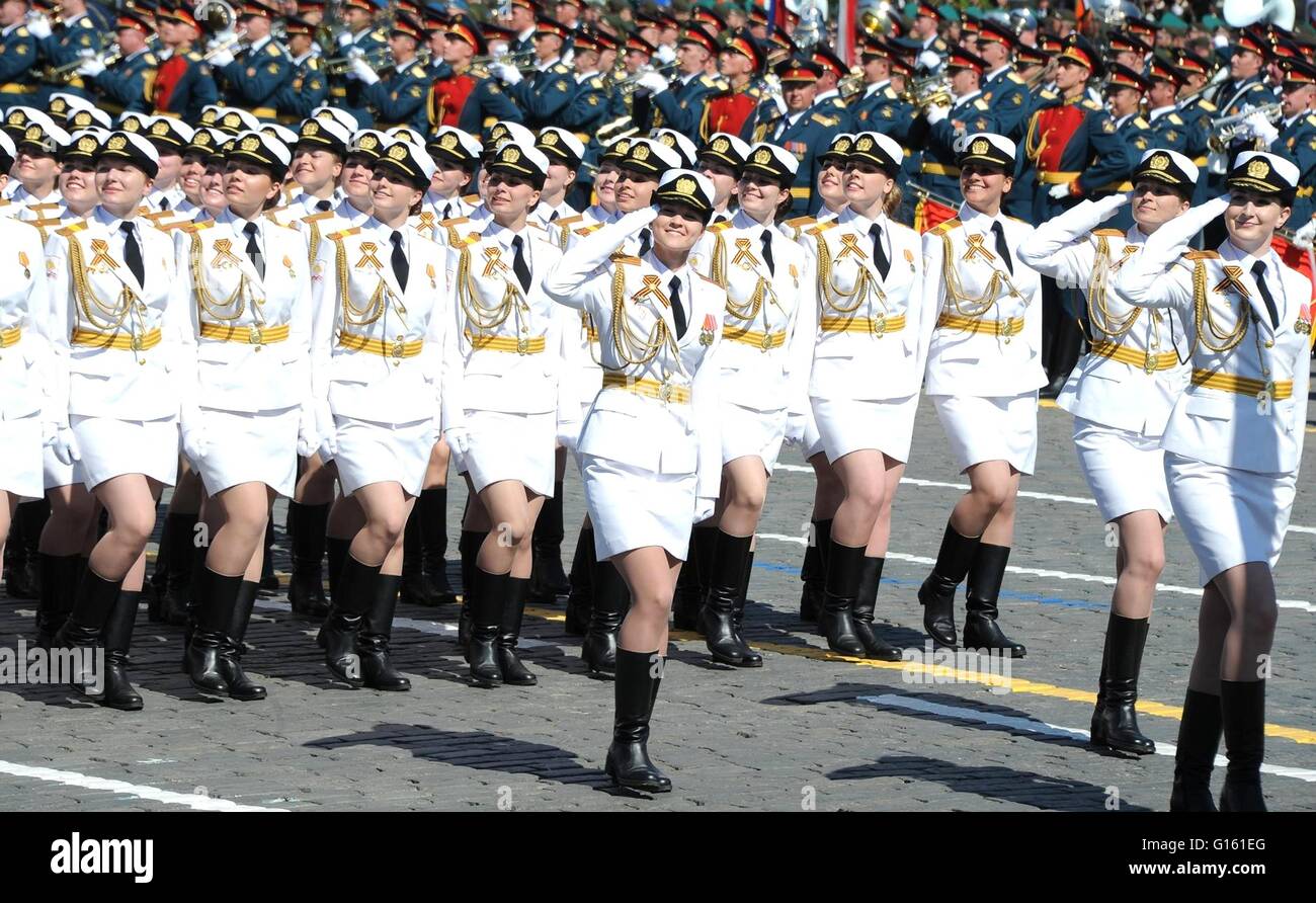 Moscow, Russia. 09th May, 2016. Russian female sailors salute as they march past the reviewing stand during the annual Victory Day military parade marking the 71th anniversary of the end of World War II in Red Square May 9, 2016 in Moscow, Russia. Credit:  Planetpix/Alamy Live News Stock Photo